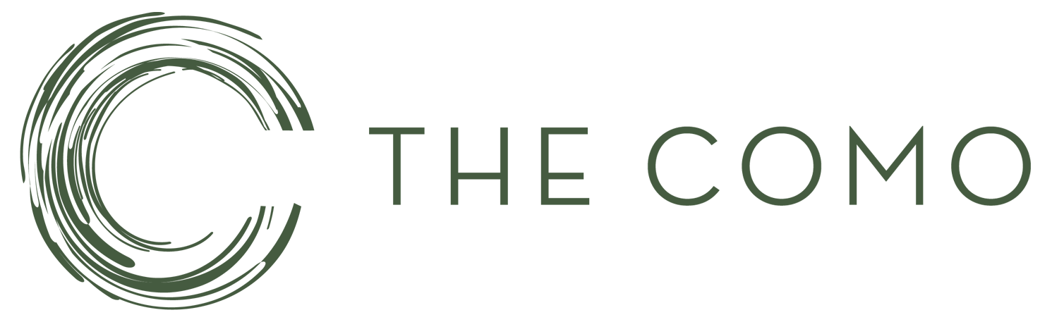 A logo for a company called the como with a circle in the middle.
