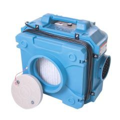 Blue air purifier with a filter visible, a round sensor, and a handle.