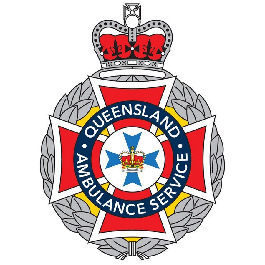 Queensland Ambulance Service emblem with crown, red cross, and laurel wreath.