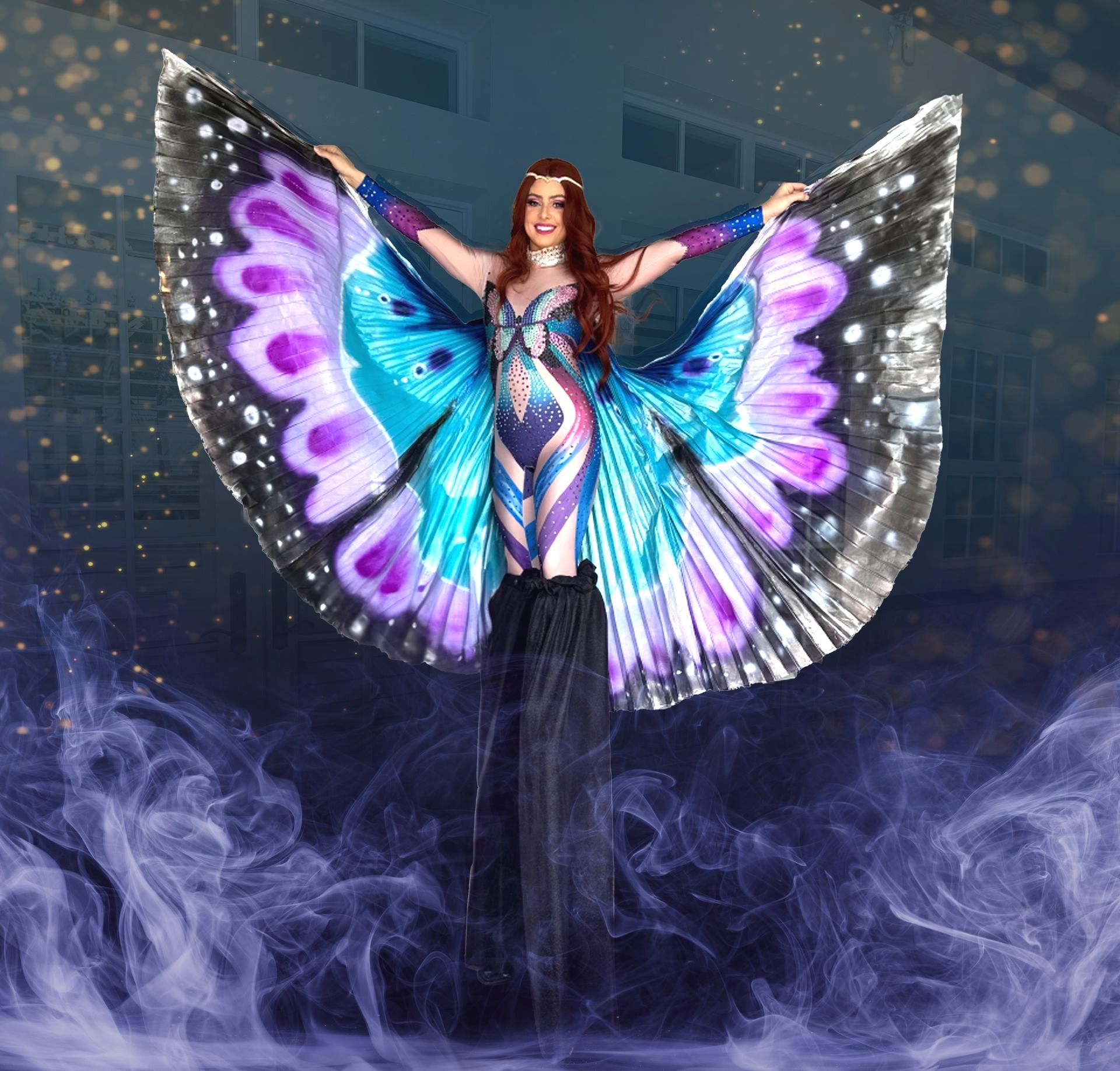 A woman in a butterfly costume is standing on stilts
