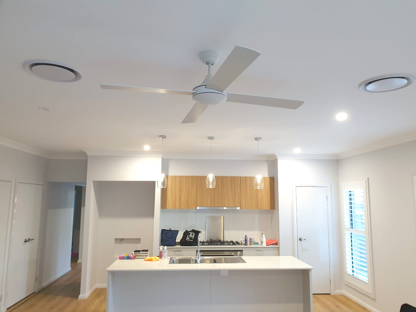 A Kitchen with Small Pendant Lights — Firefly Connections In Teralba, NSW