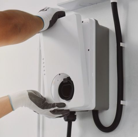 An EV Charger is Being Installed — Firefly Connections In Warners Bay, NSW
