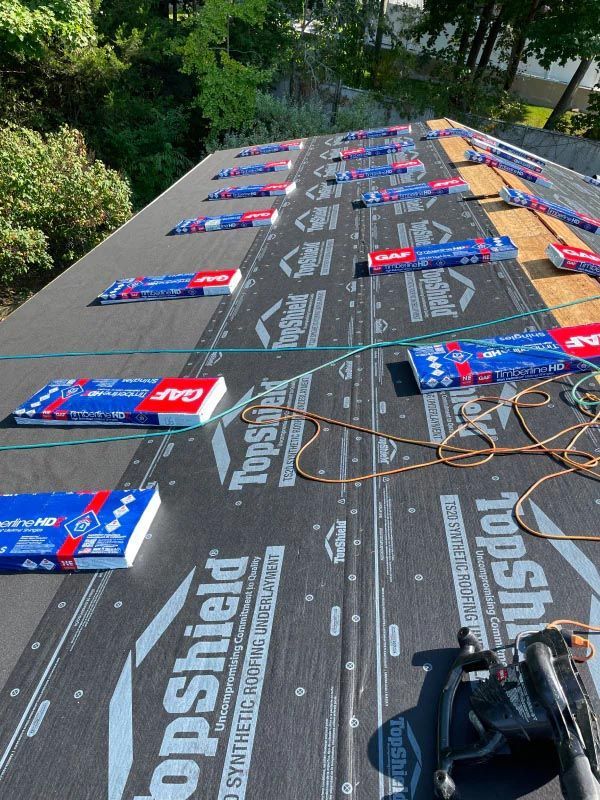 A roof with a lot of topshield sheets on it