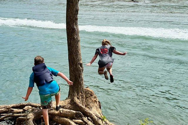 Teen Enjoying The River — Doniphan, MO — Rocky River Resort