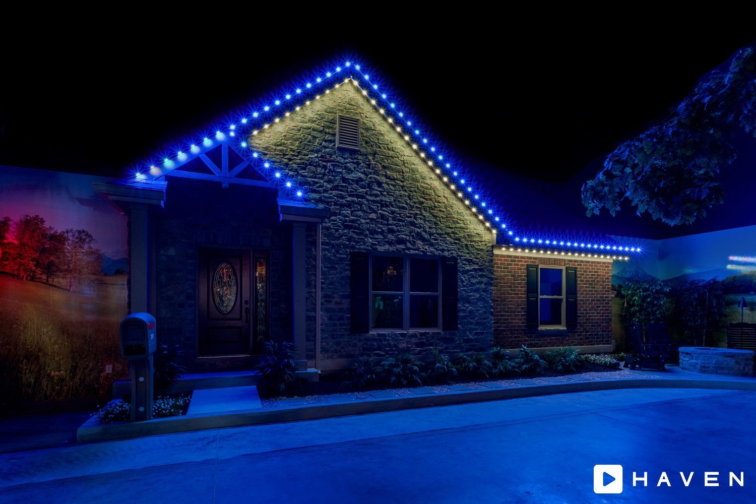 A house is lit up with blue lights at night.