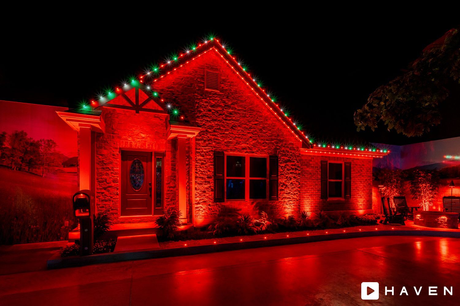 A house is lit up with red and green christmas lights.