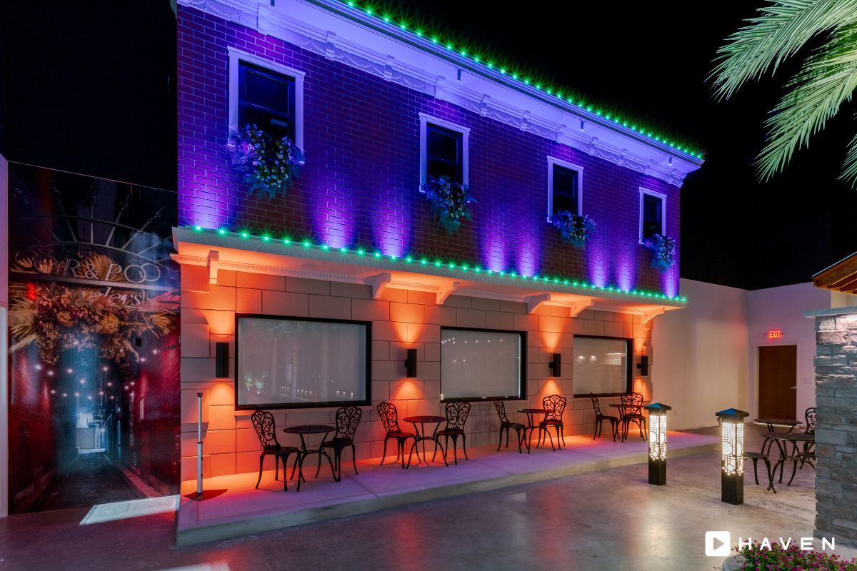 A building with a lot of lights on it at night