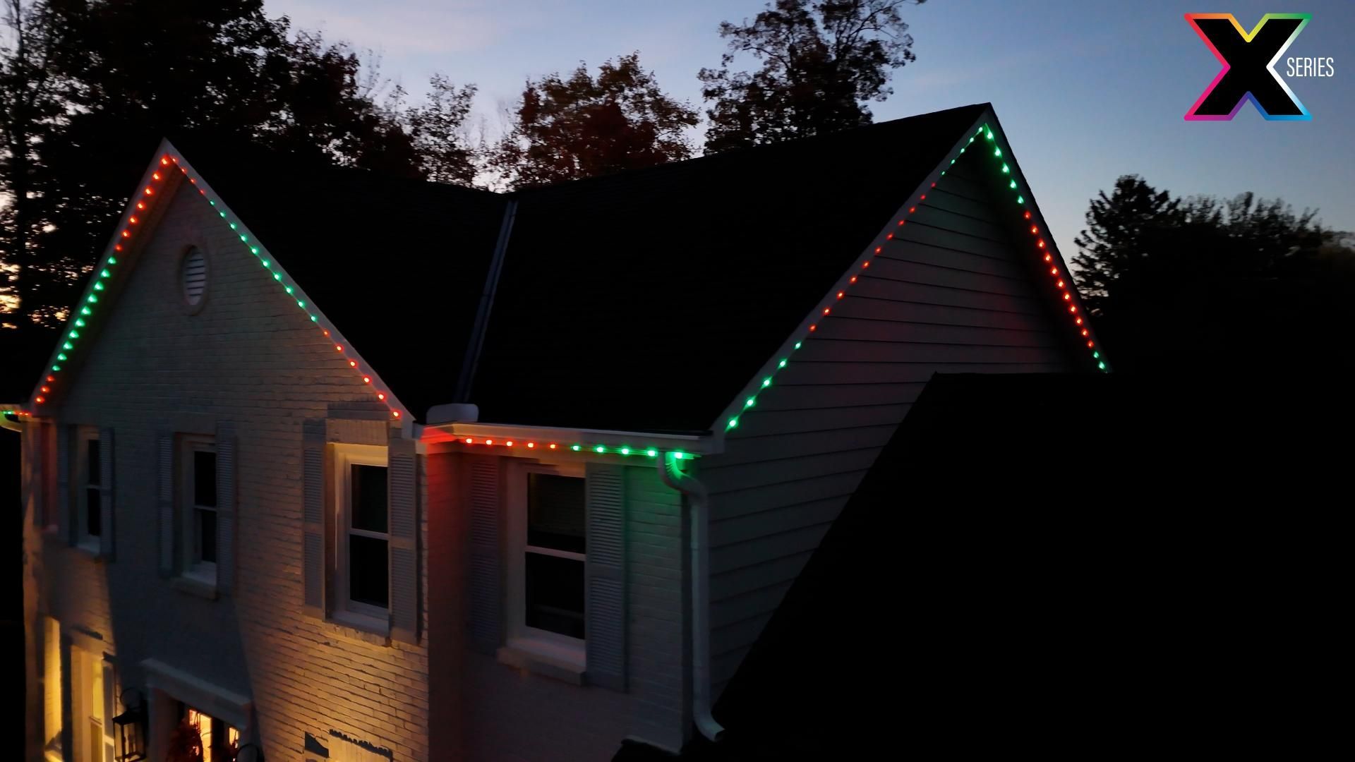 A house with christmas lights on the side of it