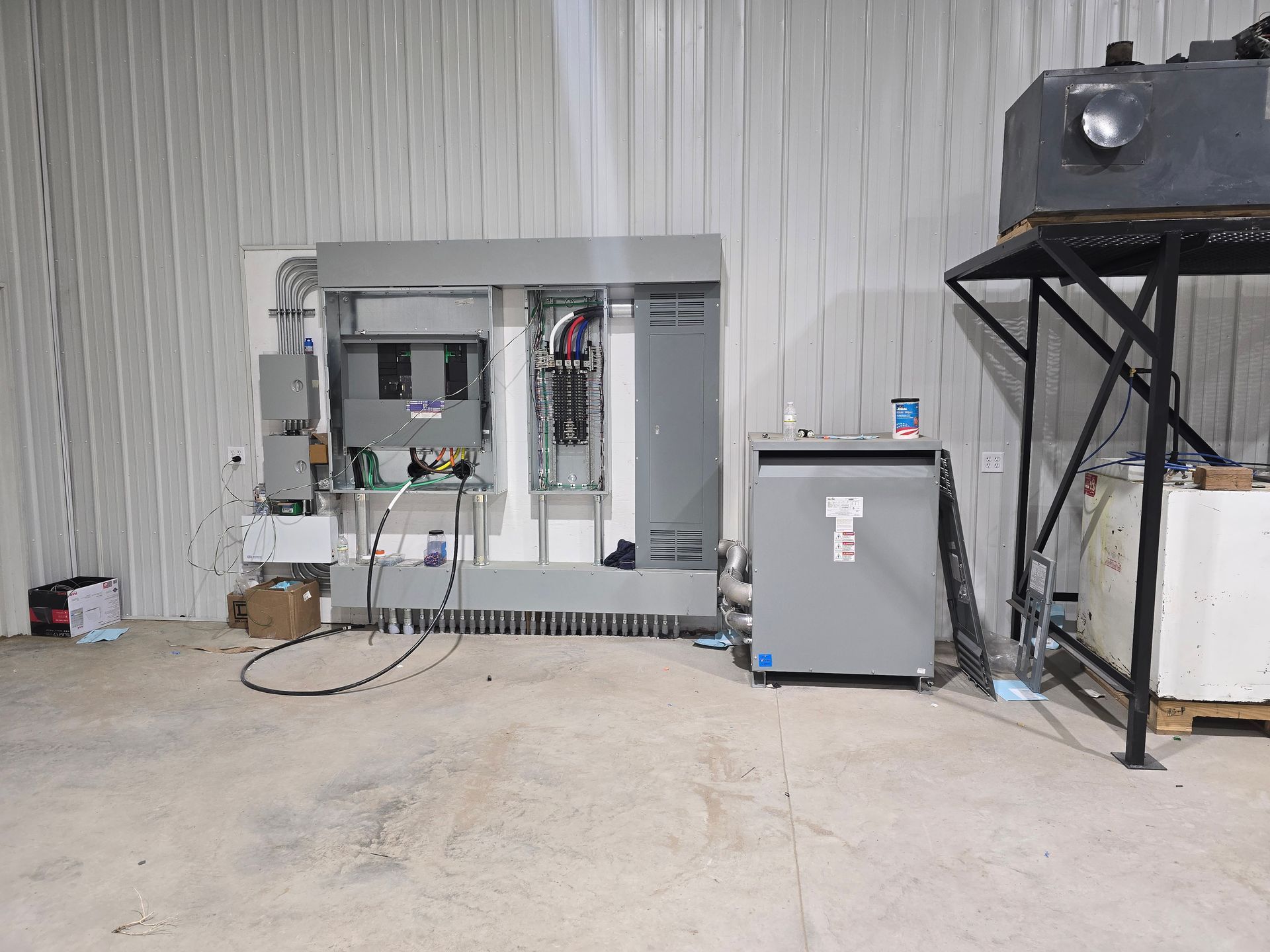 A large room with a lot of electrical equipment in it.