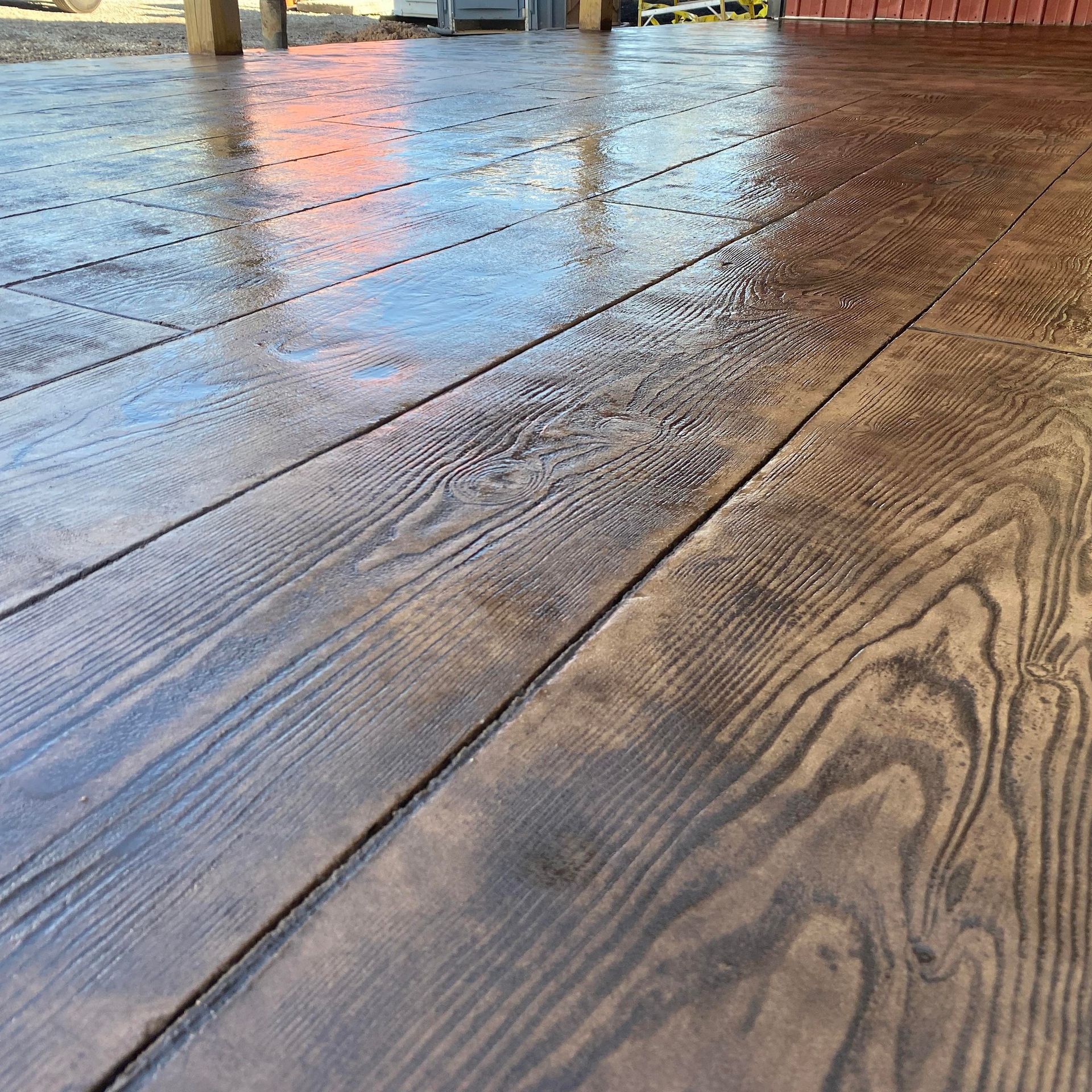 A close up of a concrete floor that looks like wood