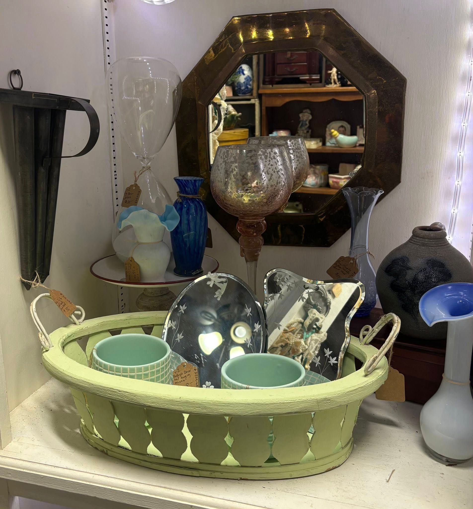  glassware, vases, and a basket.