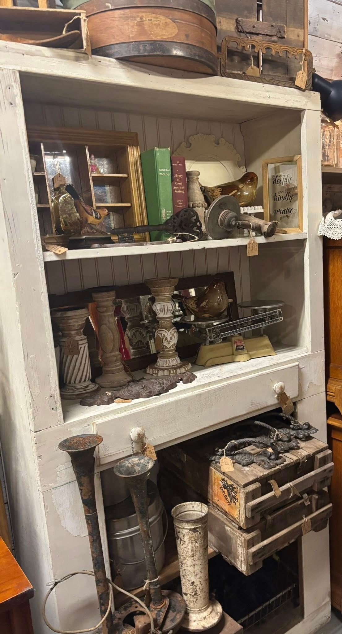  books, metal objects, and wooden chests.