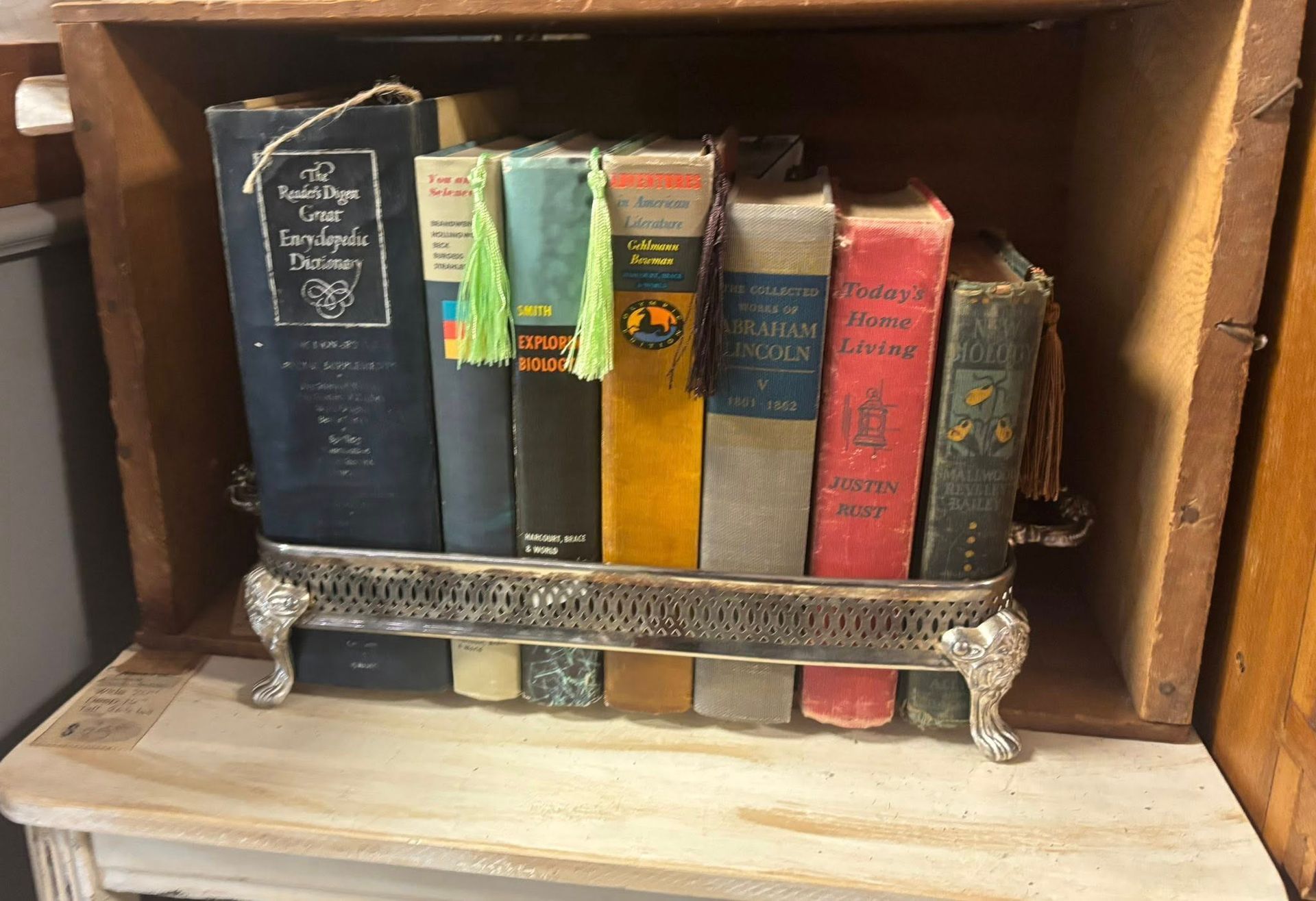 Books in a decorative silver tray 