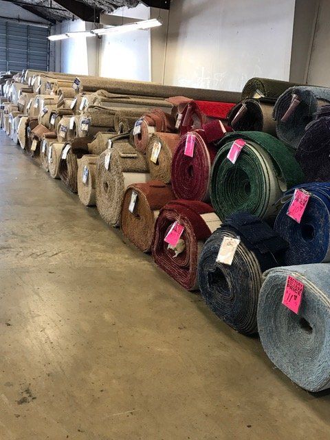 Carpet Install— Rolled Carpets in the Warehouse in Austin, TX