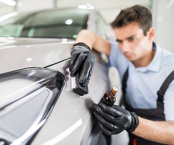 Man Applies Nano Protective Coating to the Car — Ogden, UT — BLH Detailing