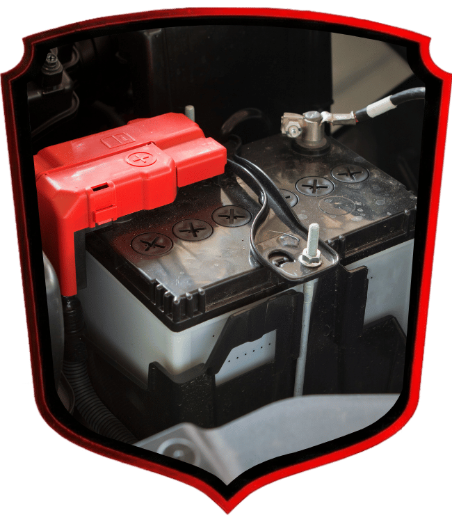Automotive battery with red positive terminal cover installed