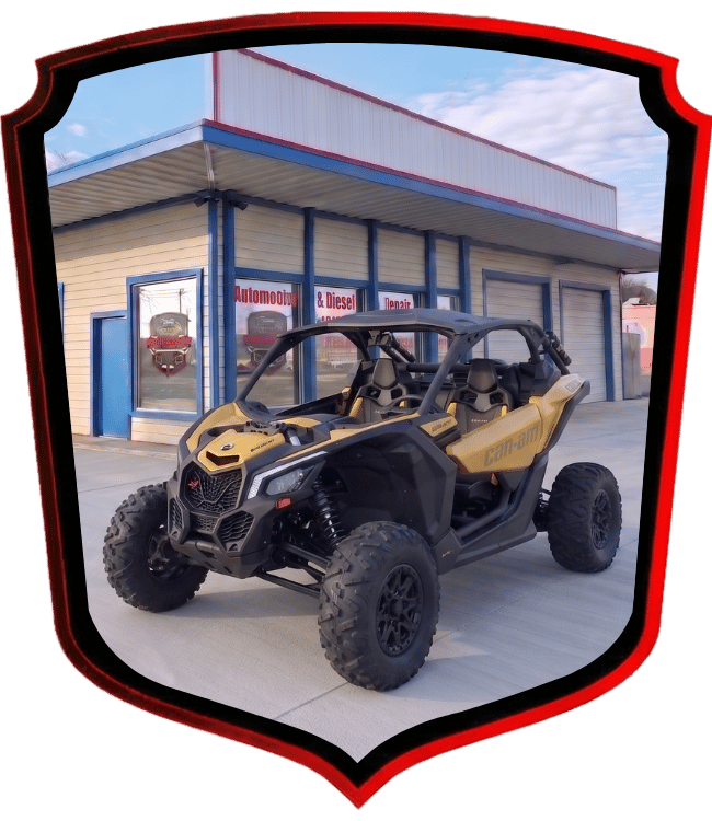 Can-Am side-by-side off-road vehicle parked outside WrenchWerks repair shop