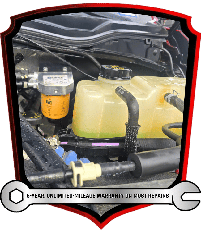 Vehicle cooling system reservoir and engine components during coolant inspection