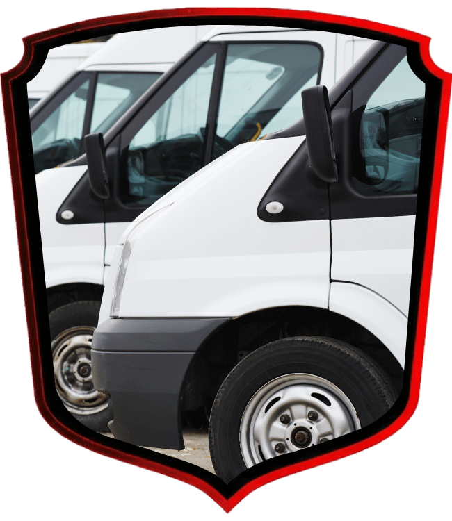 White commercial fleet vans parked in service lineup