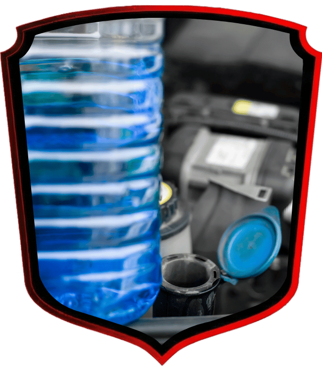 Blue windshield washer fluid container beside open reservoir