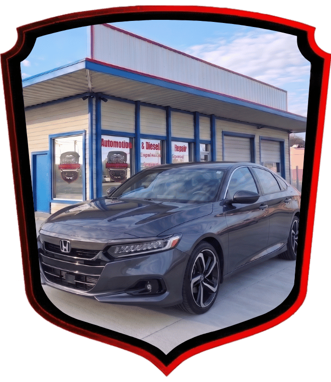 Gray Honda Accord sedan parked outside WrenchWerks automotive repair shop