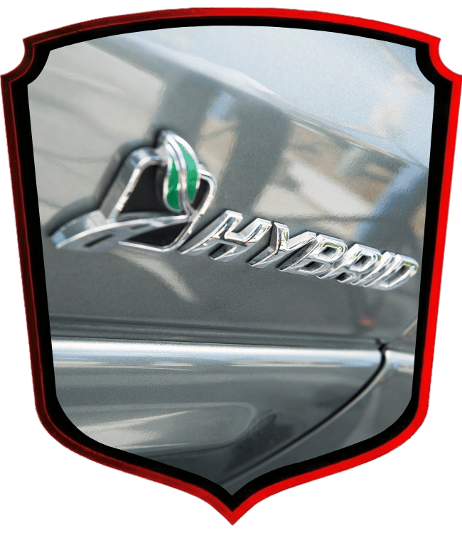 Hybrid vehicle badge emblem on silver car exterior