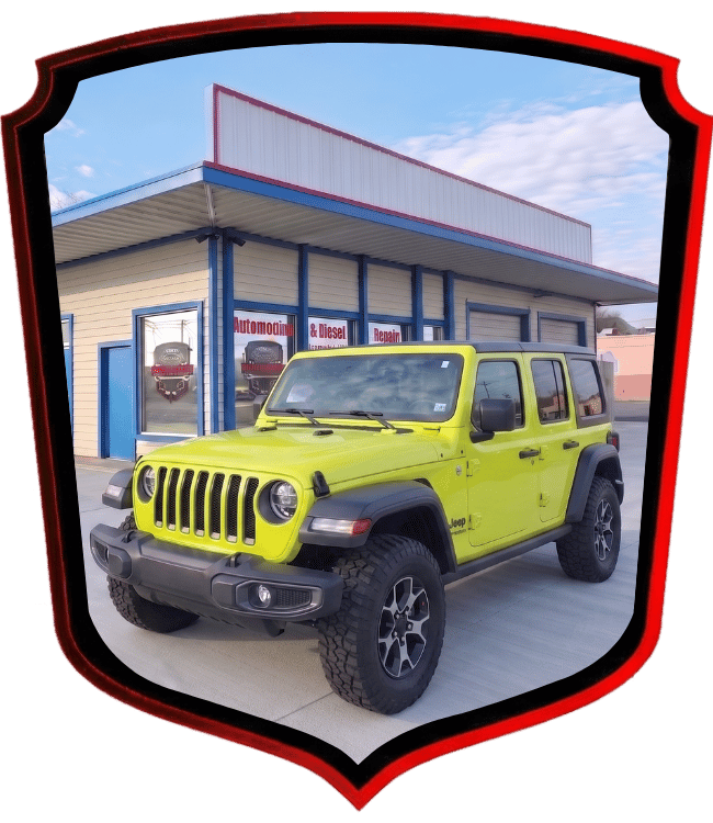 Bright green Jeep Wrangler parked outside WrenchWerks repair shop
