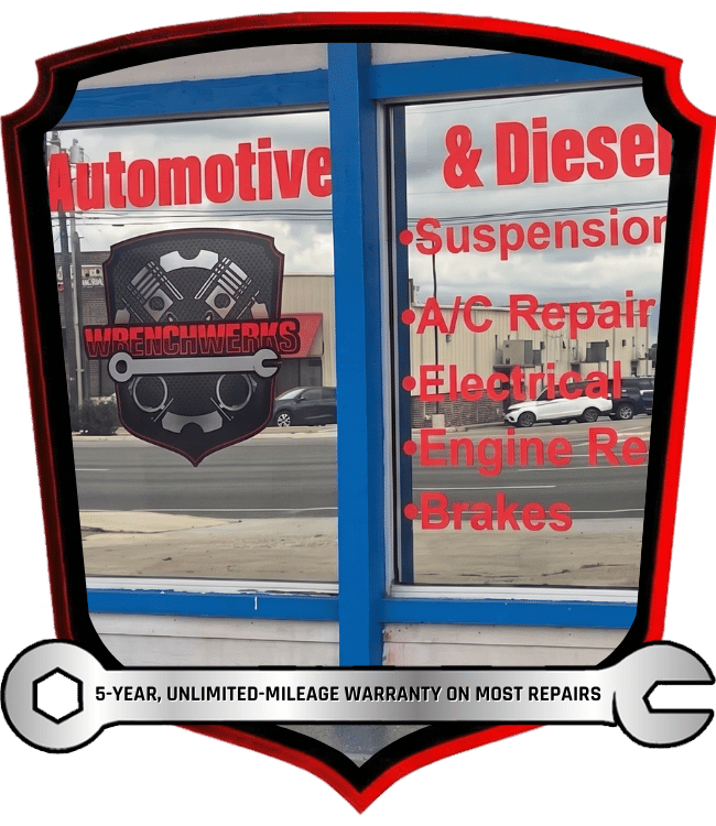 Automotive and diesel repair shop storefront with list of repair services offered