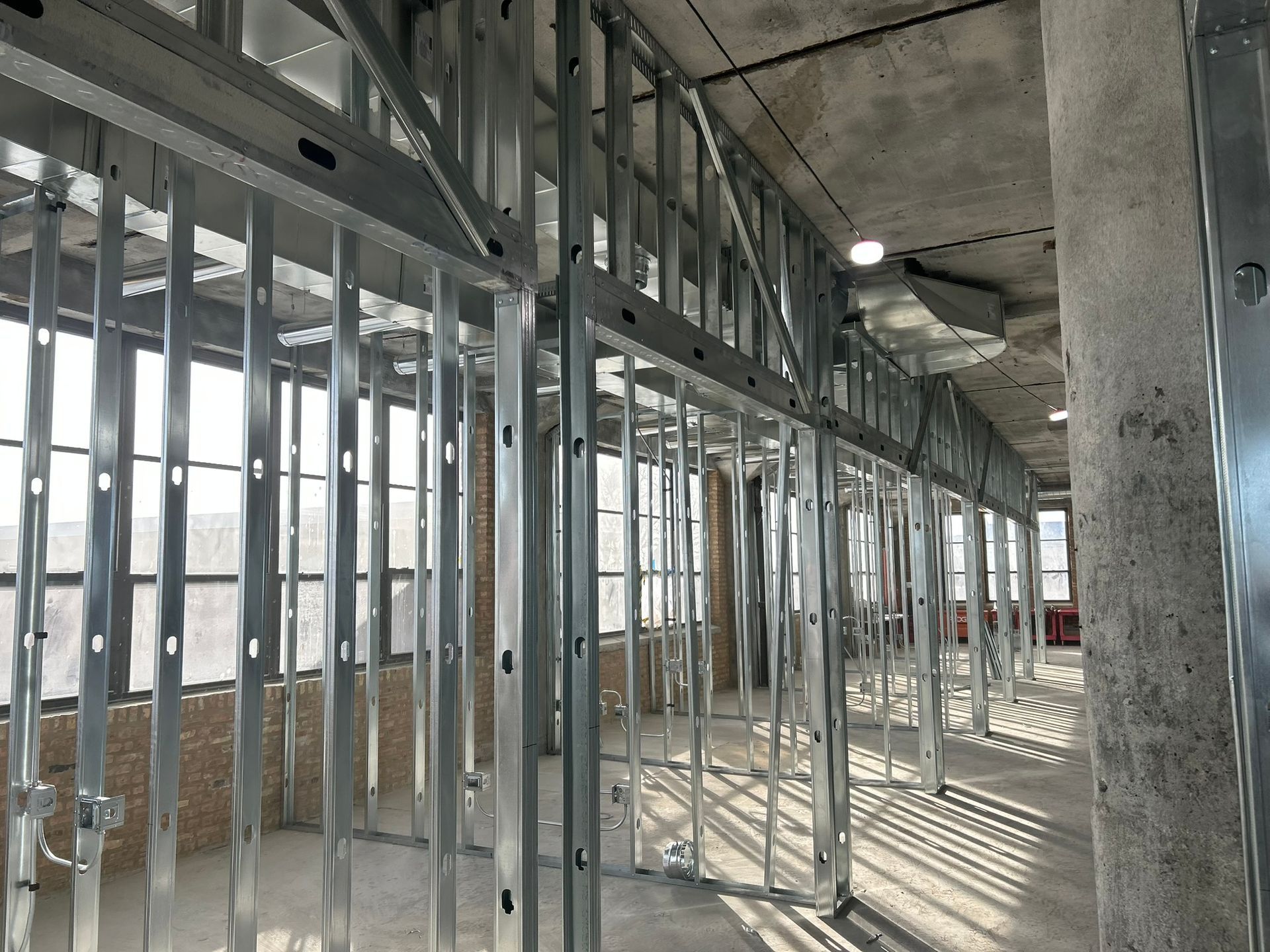 A building under construction with a lot of metal frames