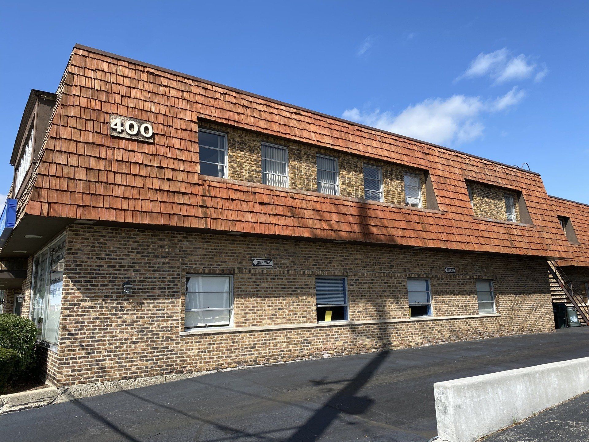 A large brick building with the number 400 on it