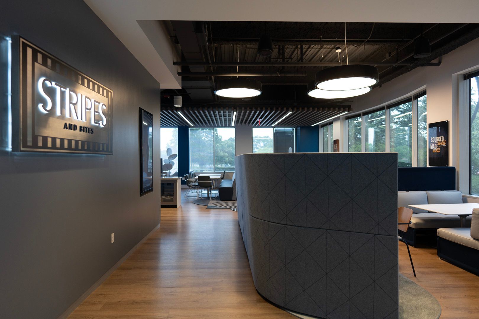 A large room with a sign that says stripes on the wall.
