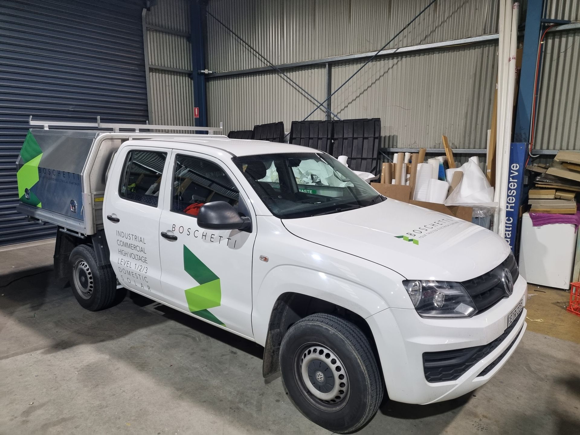 A White Ute is Parked on the Side of the Road — Robinsons Sign Makers in Lavington, NSW