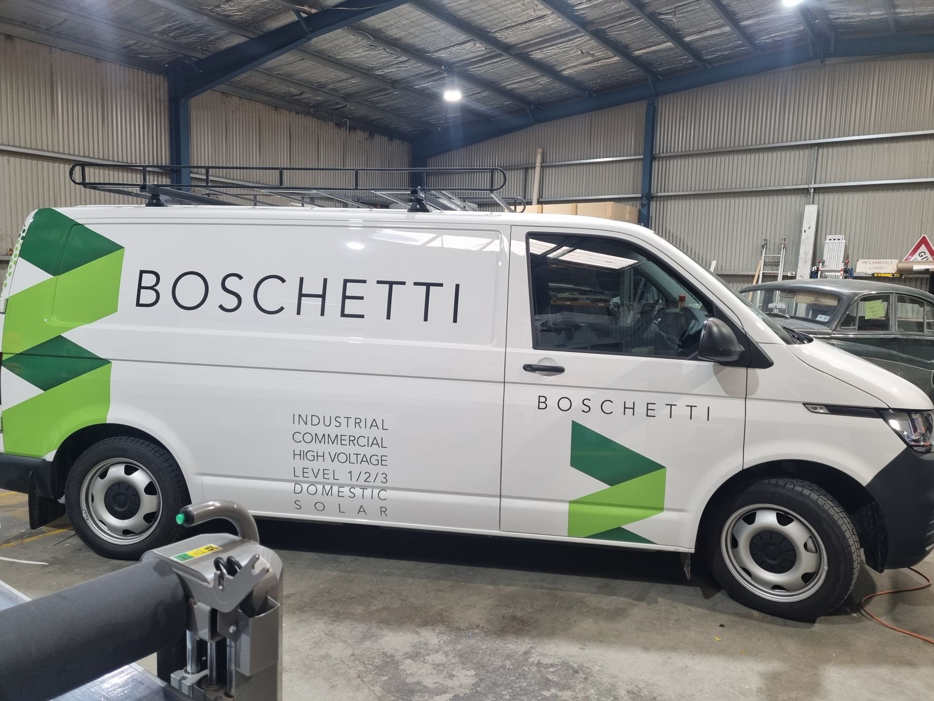 A White Van is Parked on the Side of the Road — Robinsons Sign Makers in Lavington, NSW