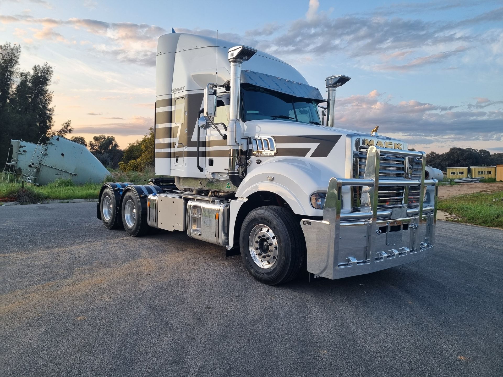 A Large Semi Truck is Parked on the Side of the Road — Robinsons Sign Makers in Lavington, NSW