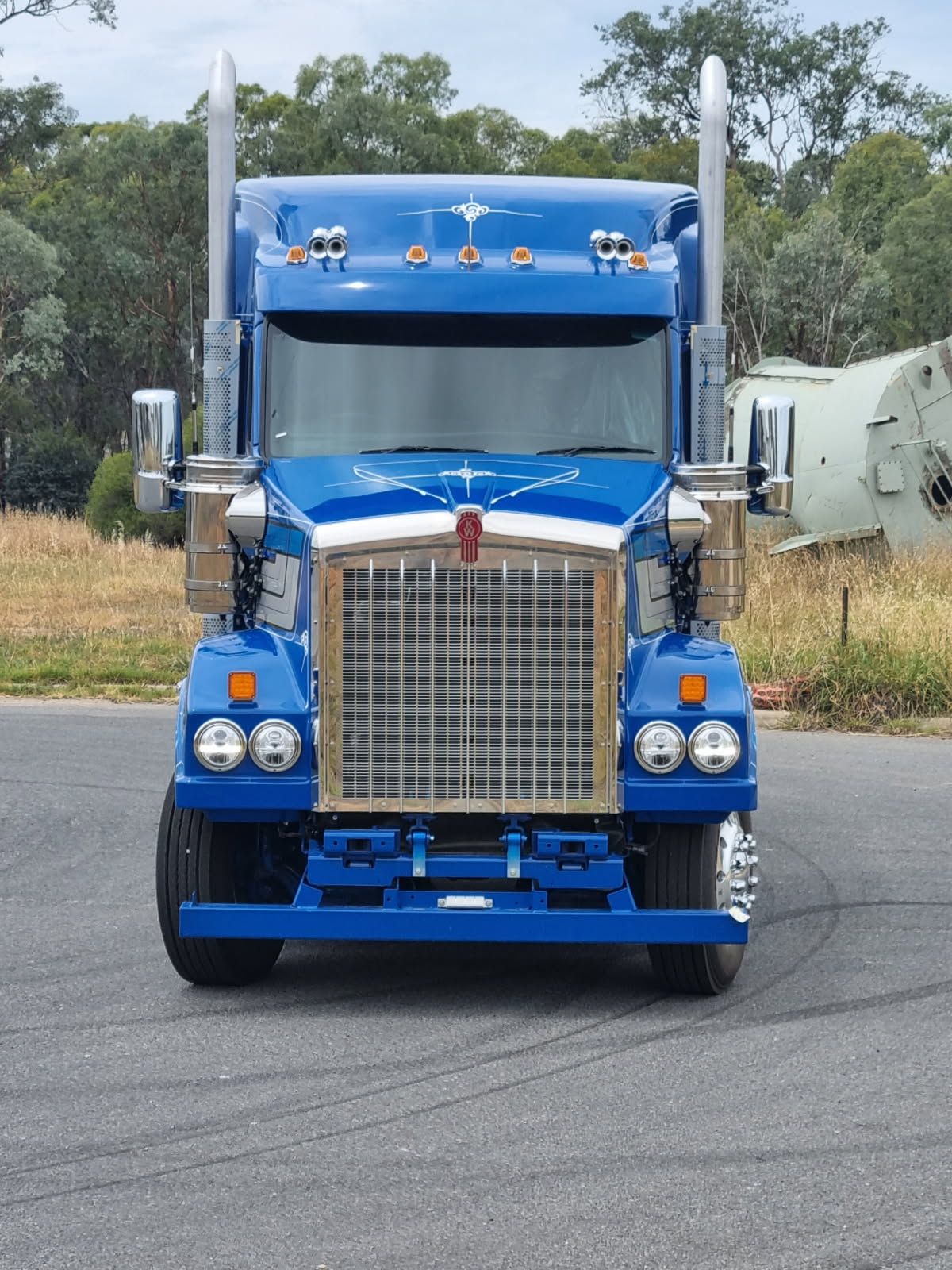 A Blue Semi Truck is Parked Facing The Camera — Robinsons Sign Makers in Canberra, ACT