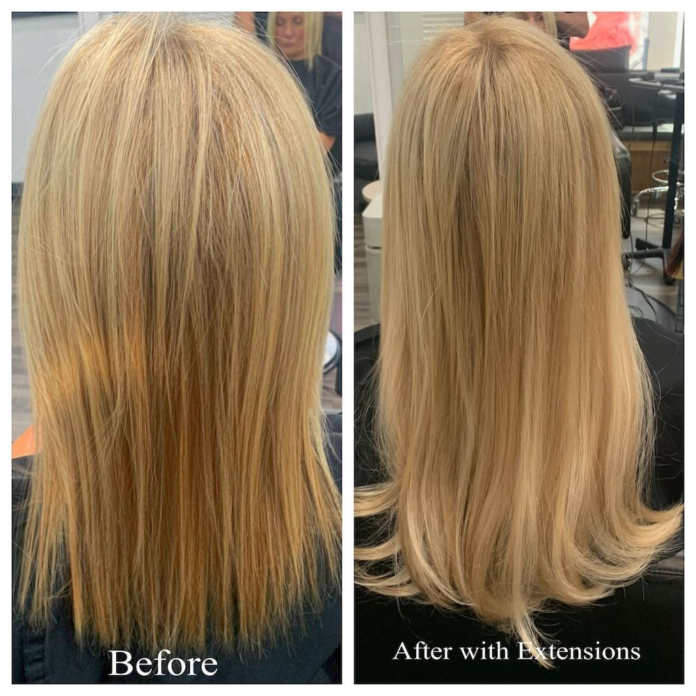 Hair stylist braiding a client’s blonde hair in a salon, with hair clips holding sections in place