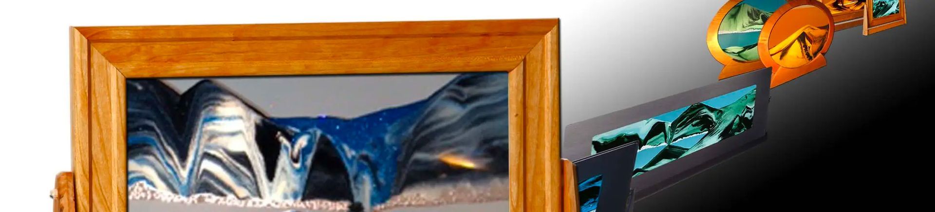 a picture of moving sand art in a wooden frame