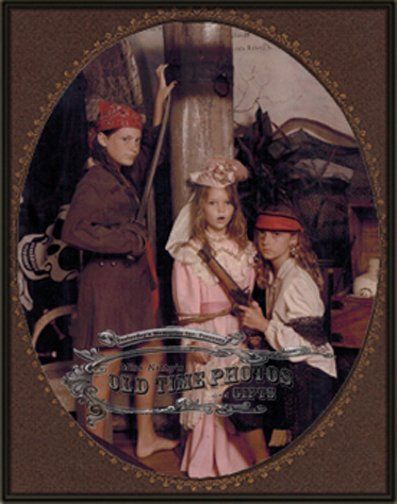 A picture of three children dressed as pirates with the words