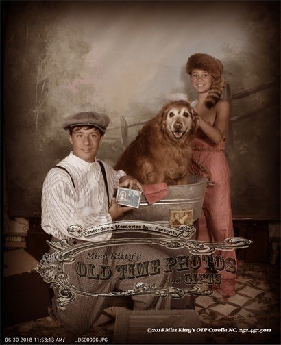 A man and a woman are posing for a picture with a dog.