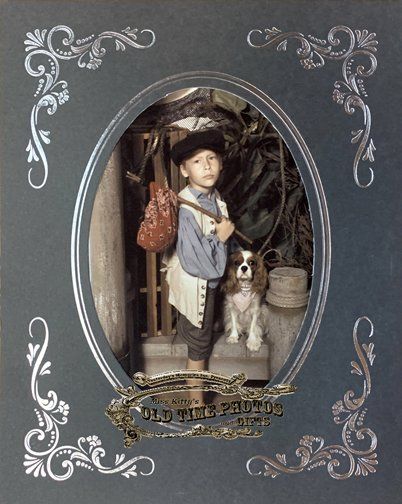 a picture of a boy and a dog with the words old time friends on the bottom