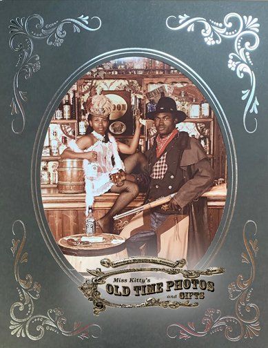 an old time photo of a man and woman in a saloon - Miss Kitty's Old Time Photos and Gifts    Corolla Outer Banks NC