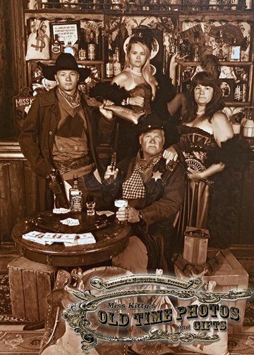 a group of people are posing for a picture in an old time photo