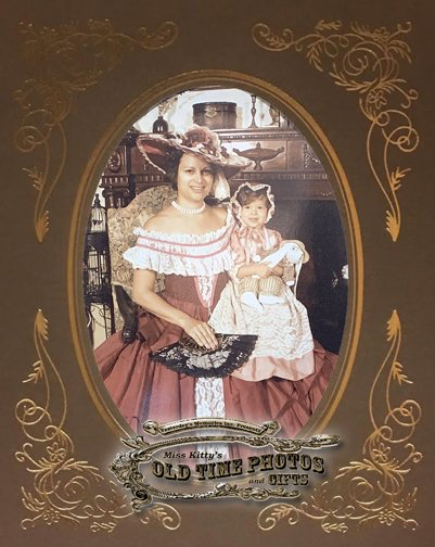 an old time photo of a woman holding a child - Miss Kitty's Old Time Photos and Gifts    Corolla Outer Banks NC