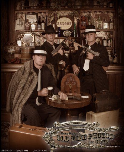 men 1020s costumes for a photo at  Miss Kitty's Old Time Photos and Gifts    Corolla Outer Banks NC