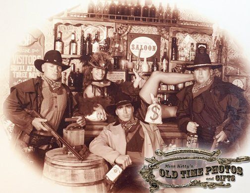 a group of cowboys standing in front of a saloon - Miss Kitty's Old Time Photos and Gifts    Corolla Outer Banks NC