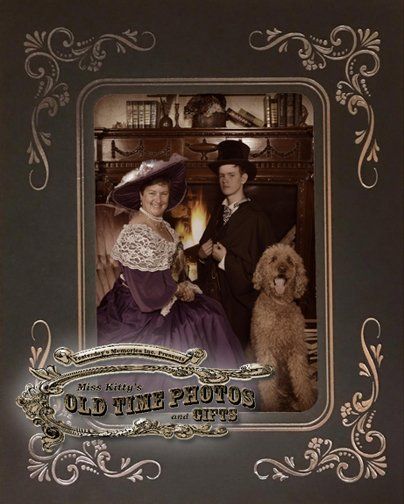 An old time photo of a man and woman with a dog