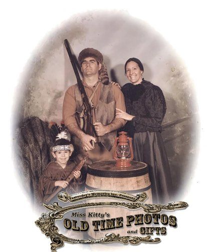 a family is posing for a picture - Miss Kitty's Old Time Photos and Gifts    Corolla Outer Banks NC