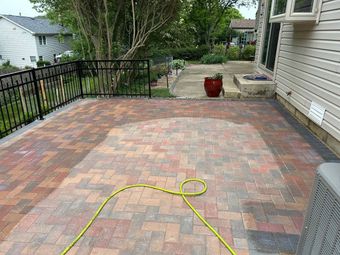 Backyard patio just got cleaned up after a paver sanding job.