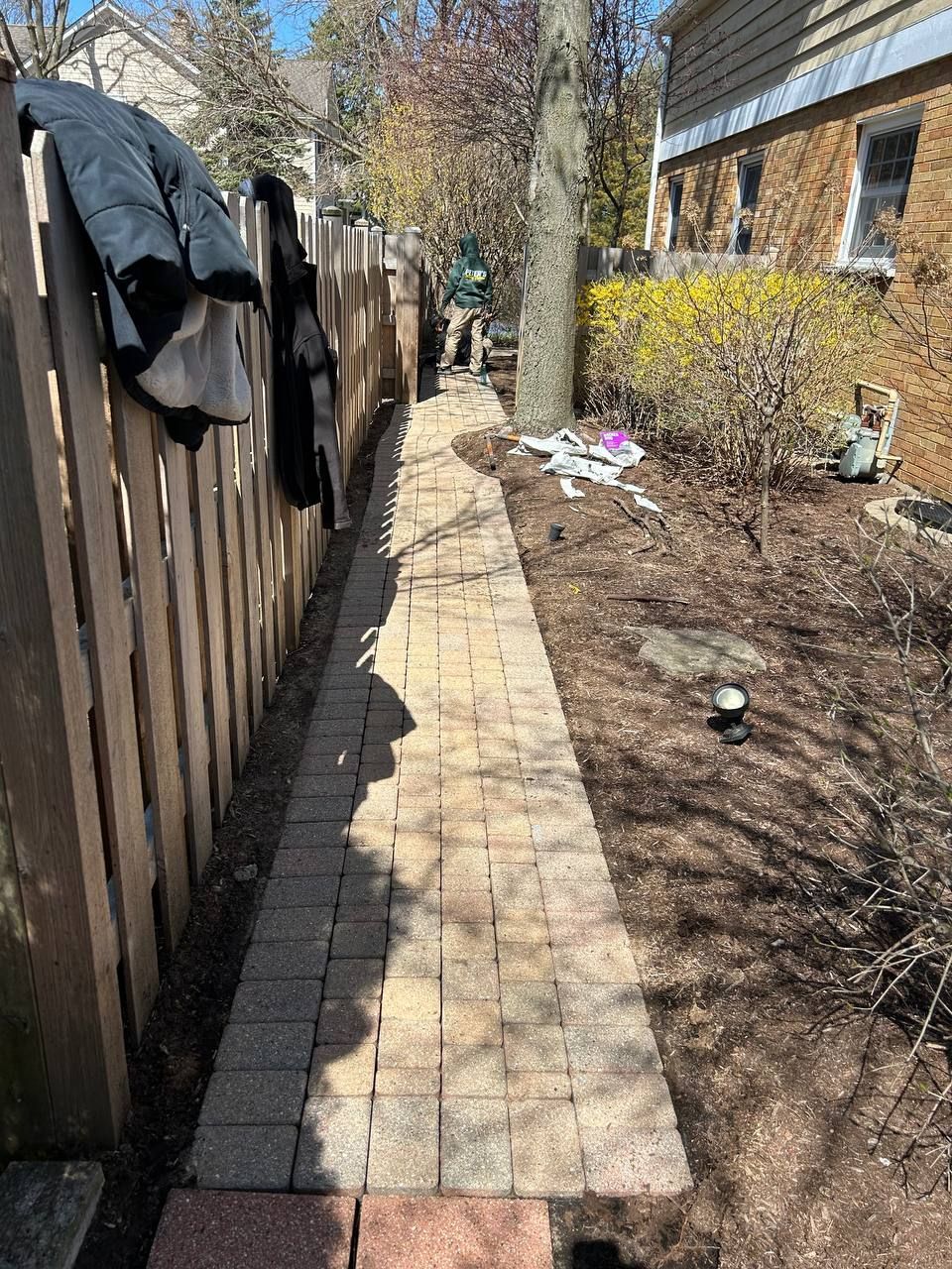 Paver sidewalk that needs paver levelling because some of the pavers are uneven. 