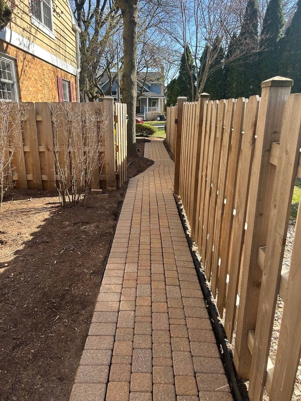 After picture of the same paver sidewalk, now evened out and more appealing to walk on. 
